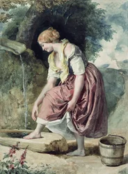 Mädchen an einer Wasserleitung